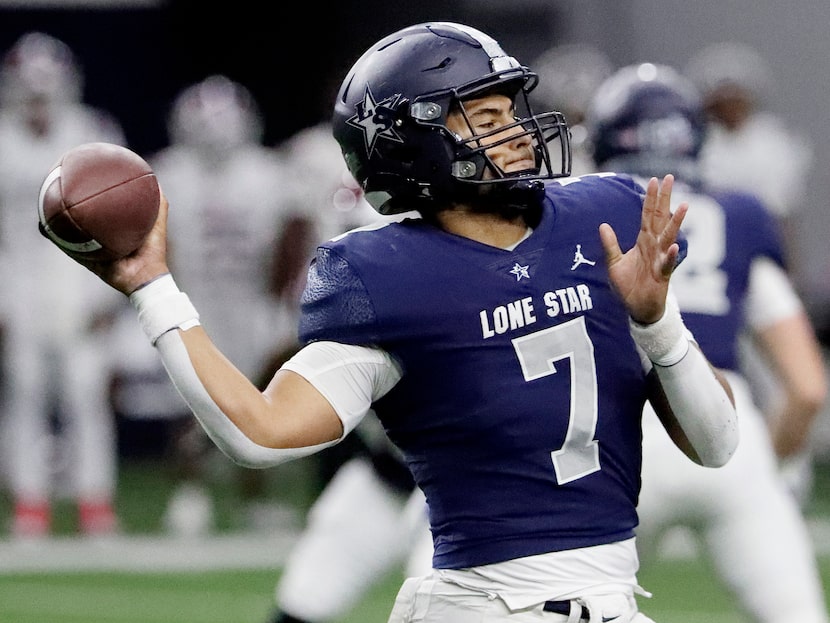 Lone Star High School quarterback Karece Hoyt (7) throws a long ball during the first half...