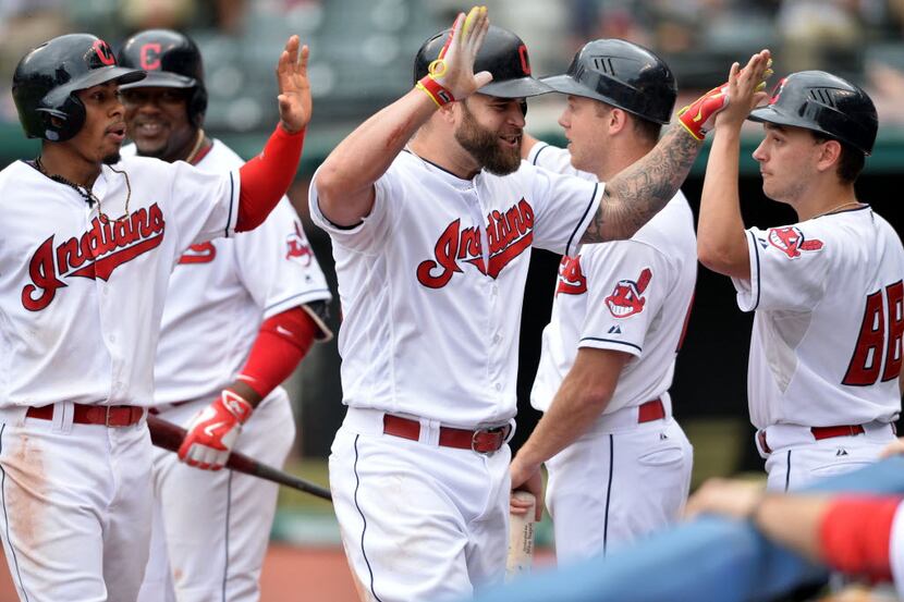 May 29, 2016; Cleveland, OH, USA; Cleveland Indians designated hitter Mike Napoli (26) and...