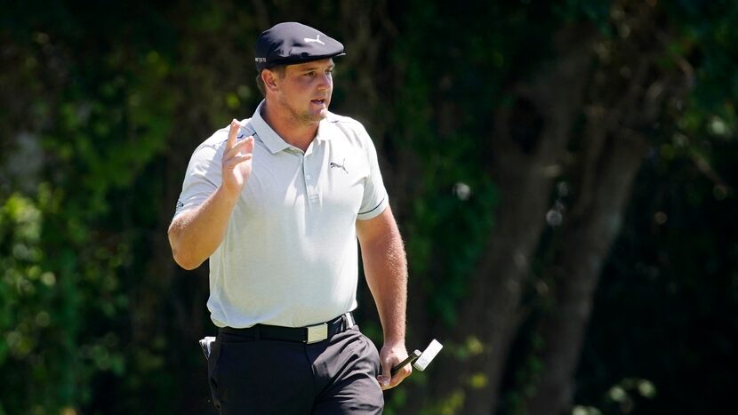 PGA Tour golfer Bryson DeChambeau wave after his eagle putt on No. 11 during the third round...