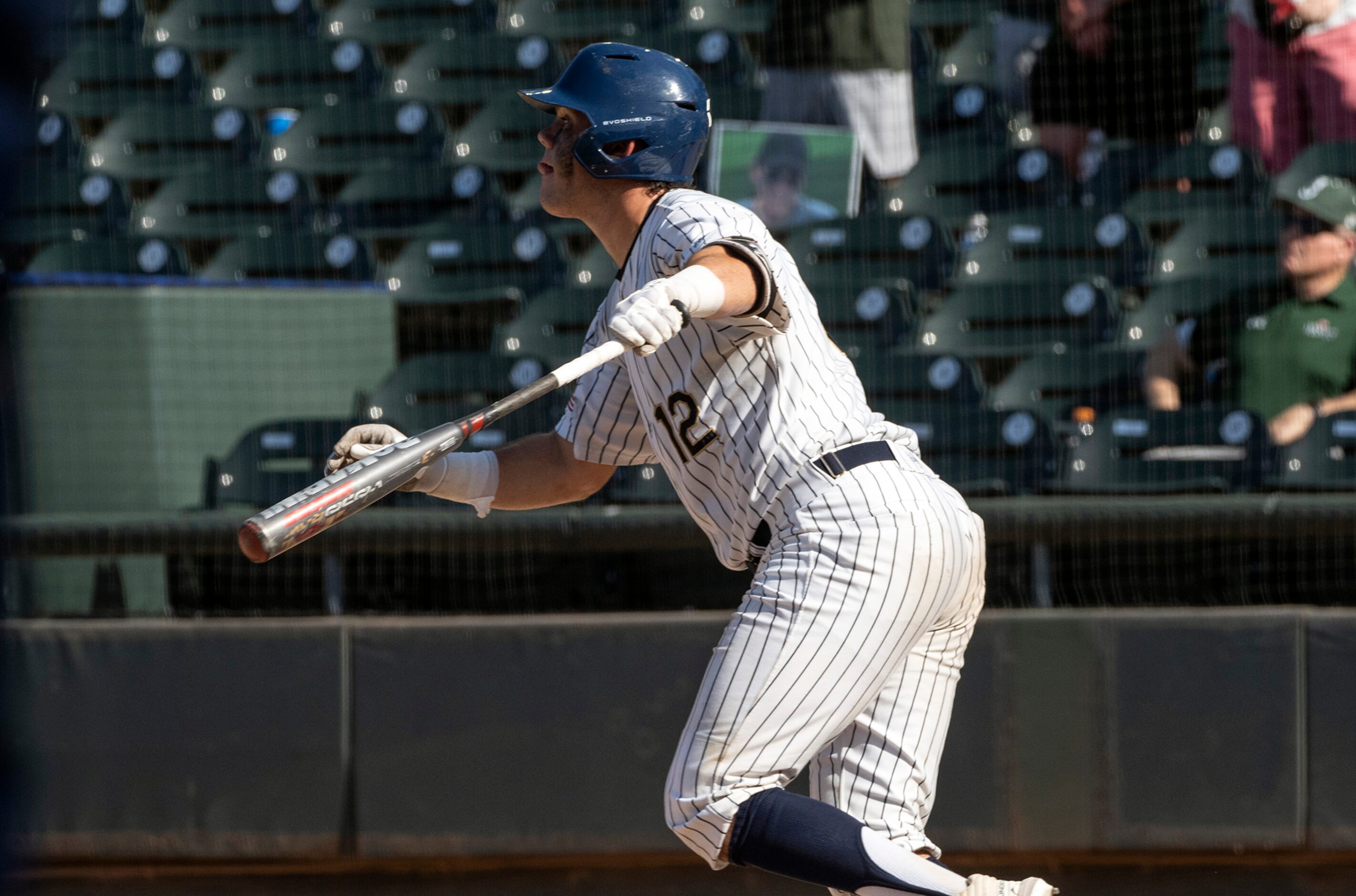 Keller Whit Thoms, (12), watches his RBI double against Houston Strake Jesuit during the...