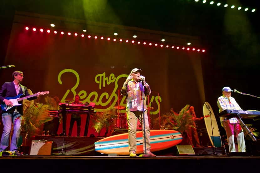 Mike Love, center, and Alan Jardine, right, of The Beach Boys perform at Verizon Theatre in...