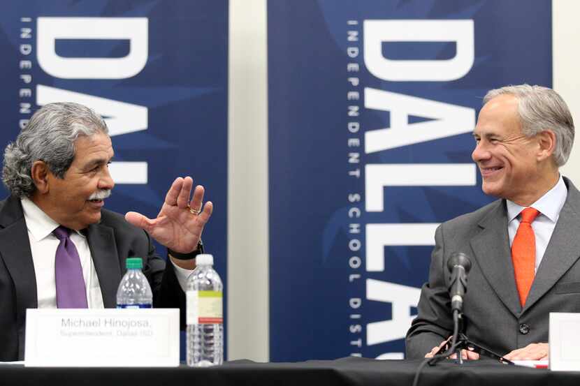 Dallas ISD Superintendent Michael Hinojosa (left) and Gov. Greg Abbott meet with teachers...