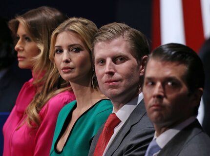 Family members of then-President-elect Donald Trump (from left), including wife Melania,...