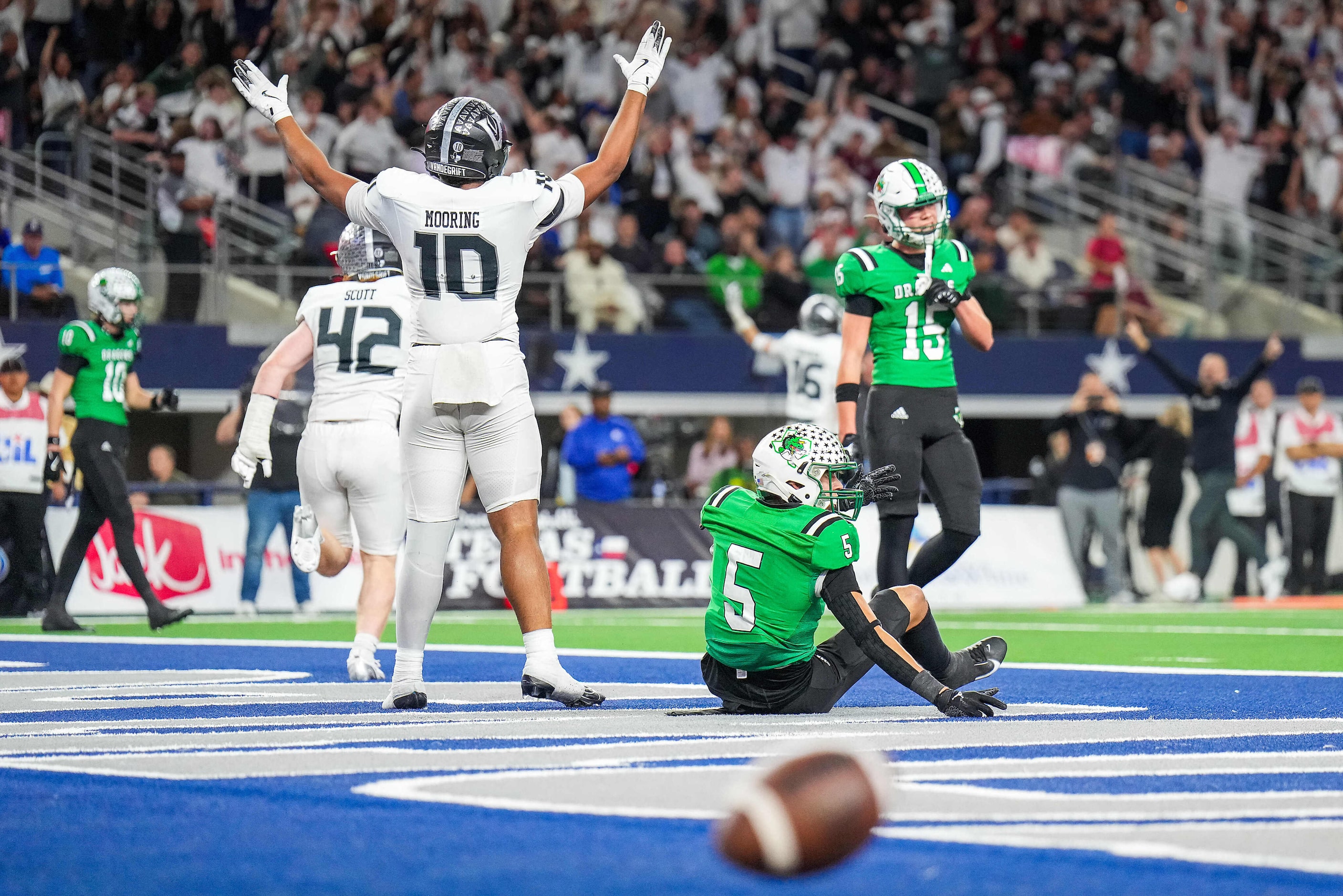 Austin Vandegrift linebacker Caleb Mooring (10) celebrates after a pass in the end zone to...