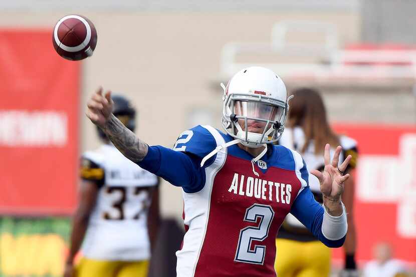 Montreal Alouettes quarterback Johnny Manziel warms up for the team's Canadian Football...