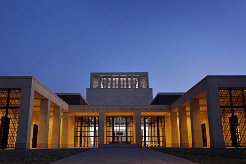 The evening sun sets over the front entrance to the George W. Bush Presidential Library and...
