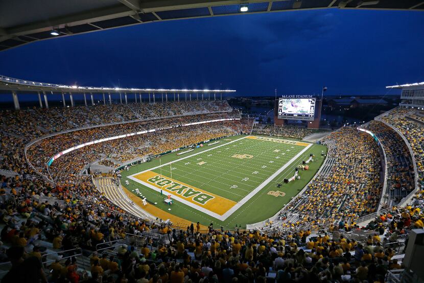 The field is cleared due to a lighting delay between the Baylor vs. Oklahoma State game at...