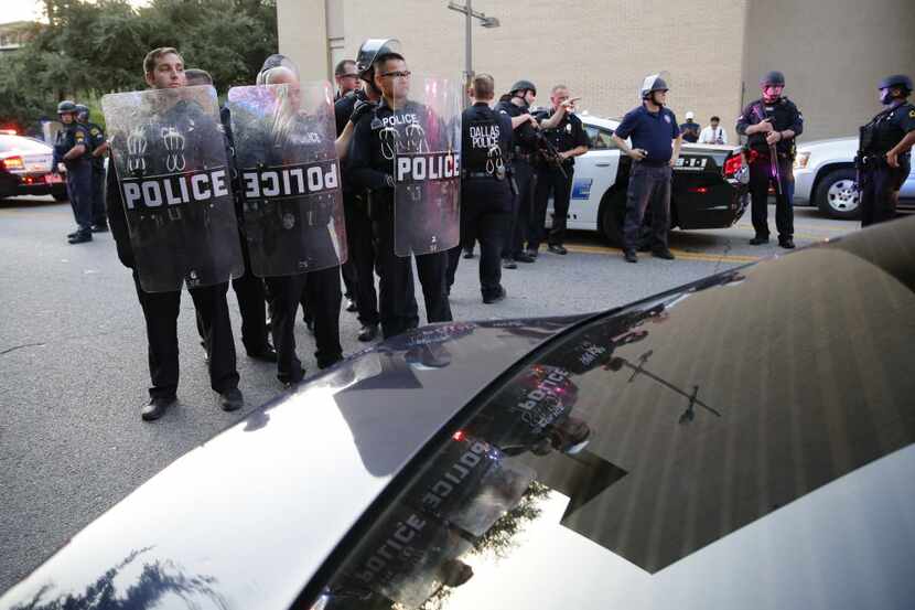 Dallas police ordered protesters to get out of the road near El Centro College last Friday.