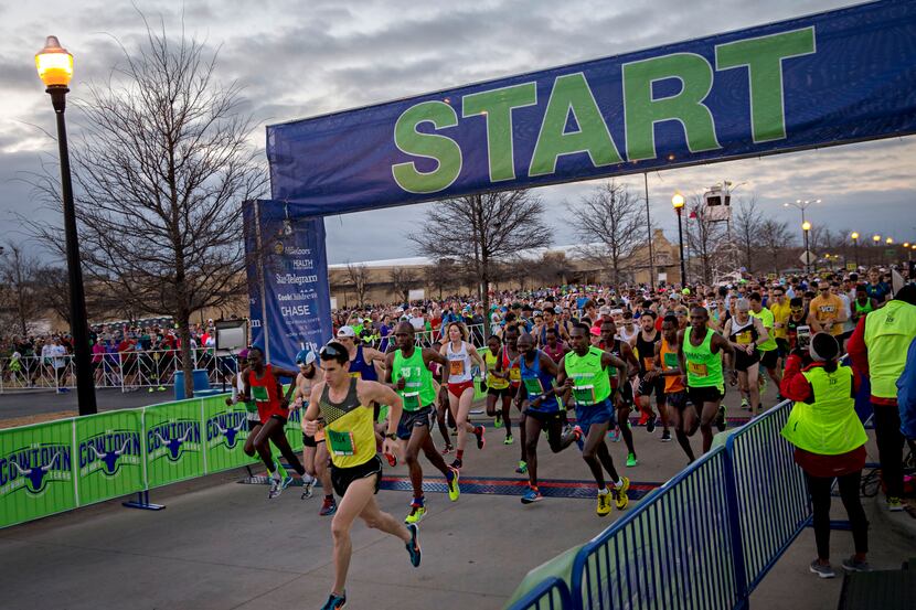 Elite runners being their race during The Cowtown marathon Feb. 28, 2016 in Fort Worth. 