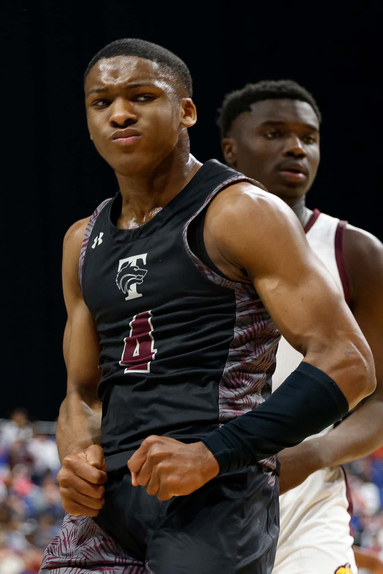 Mansfield Timberview guard Donovan O'Day (4) flexes after a called foul against Beaumont...