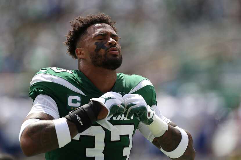 New York Jets strong safety Jamal Adams (33) takes a moment before an NFL football game...