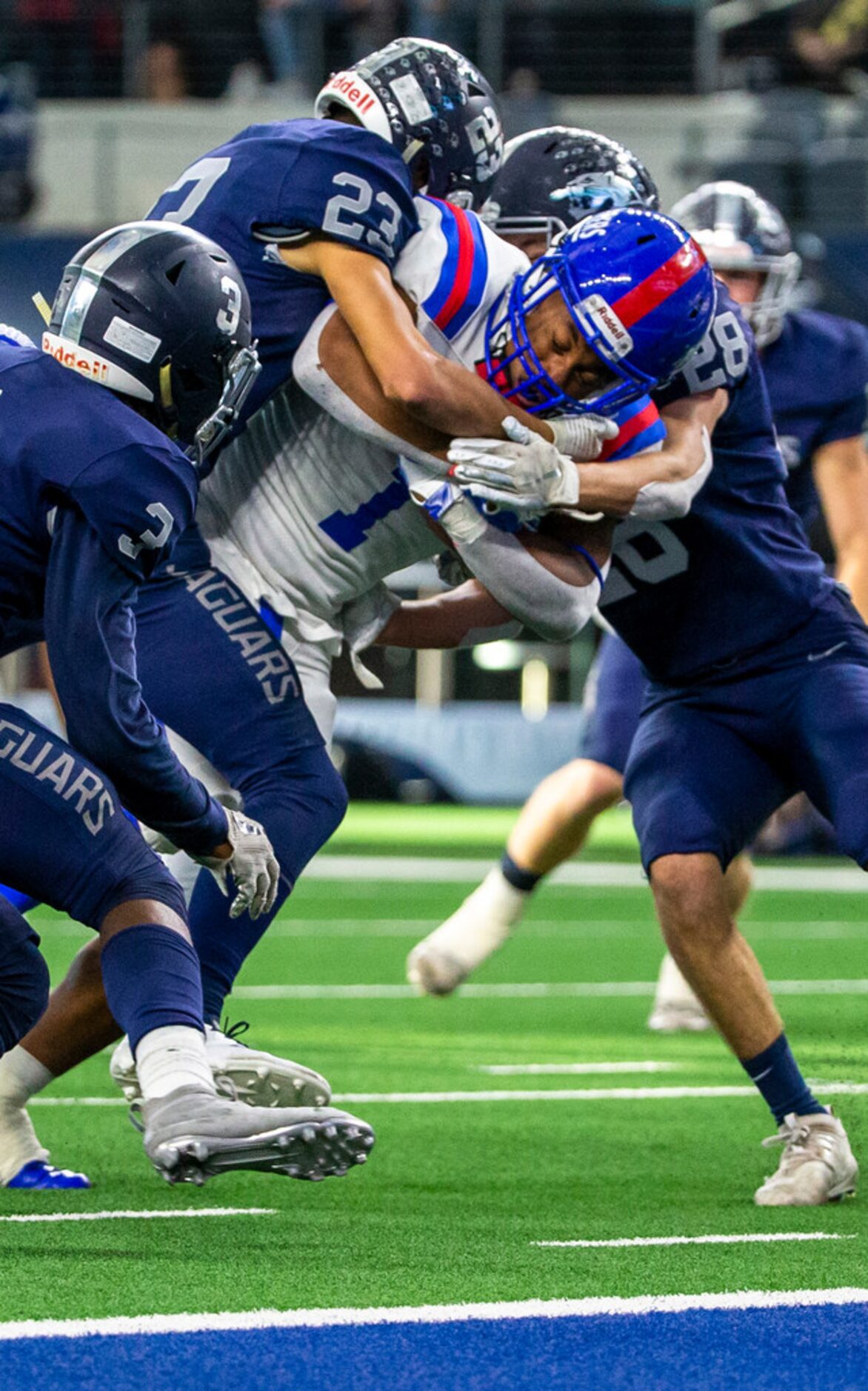 Duncanville running back Trysten Smith (1) pushes past Flower Mound defense to score a...