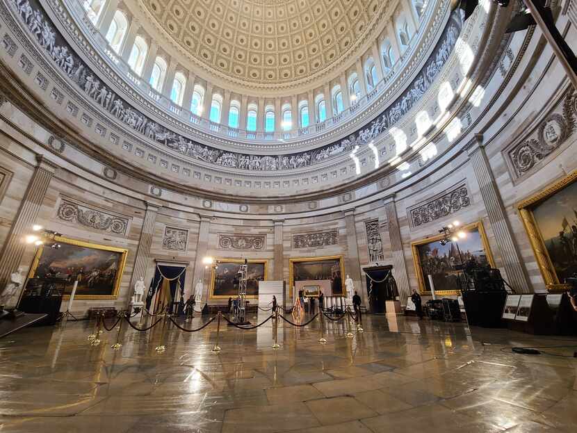 With security tight, the U.S. Capitol Rotunda was empty on Tuesday, the day before Joe...
