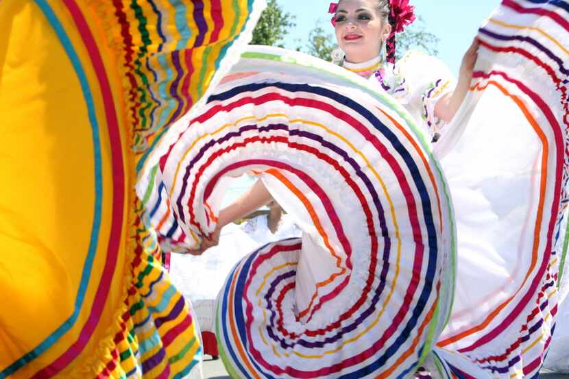 Sunset Dance Compay's Samantha Arias performs at the Oak Cliff Cinco de Mayo parade takes...