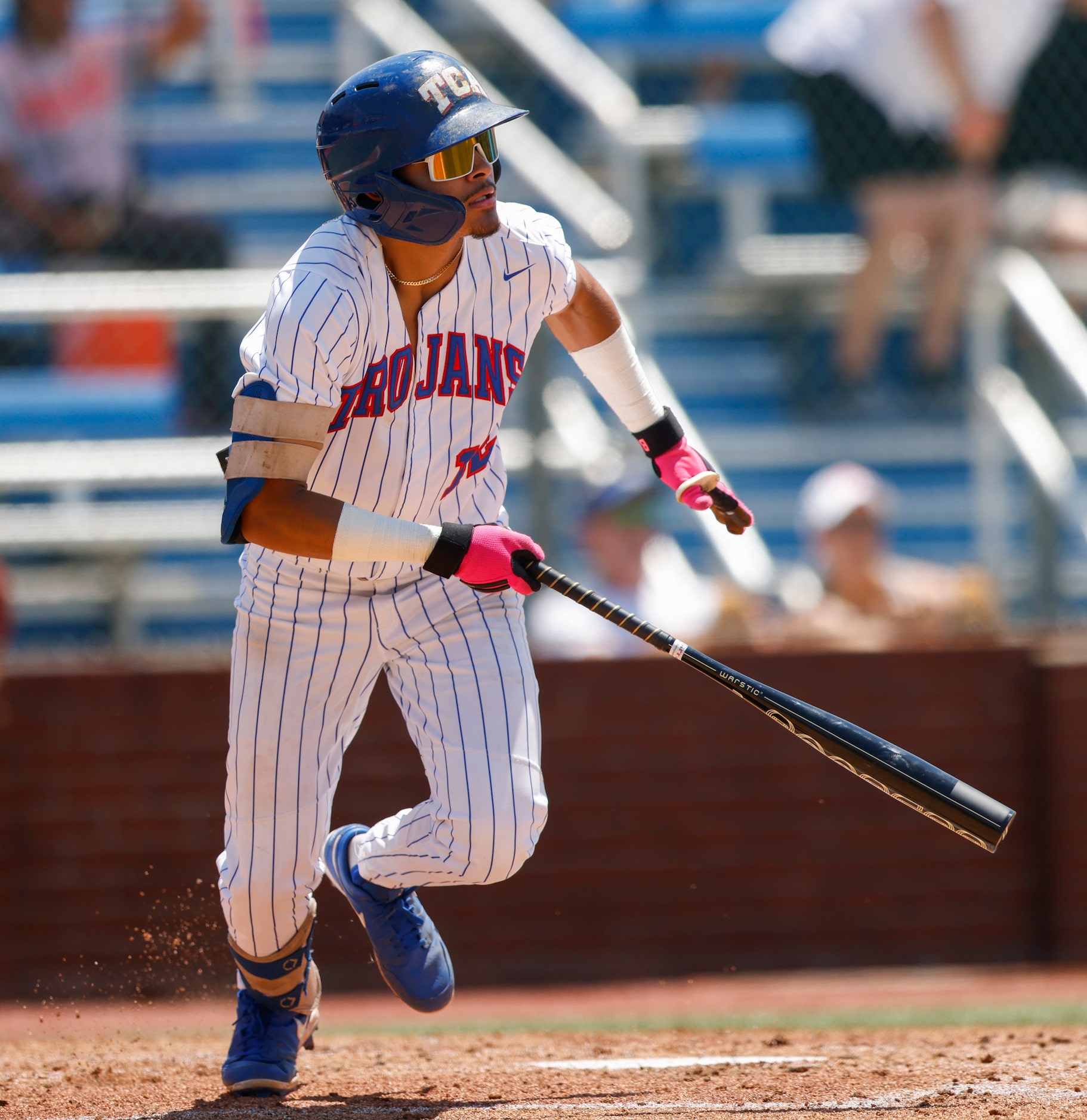 Trinity Christian’s Steven Ramos (12) runs after hitting the ball in the third inning...