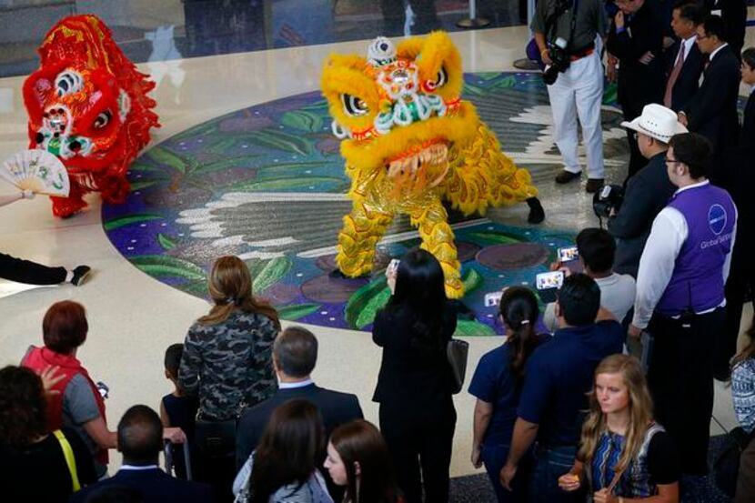 
Lion performers from Lee’s White Leopard Kung Fu School helped kick off American Airlines’...