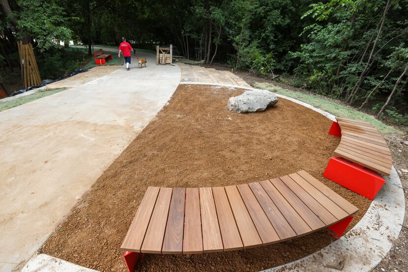 John Craig walked Thor, 5, along the Starwood Trail Extension in Frisco on May 26. The new...