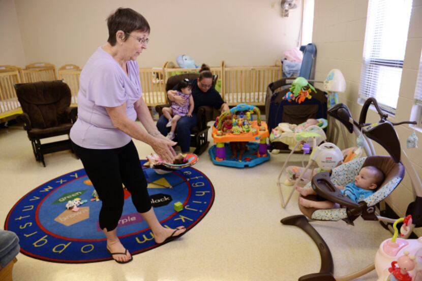 Kitty Dieterick, a volunteer in the nursery at the New Hope Learning Center at First United...