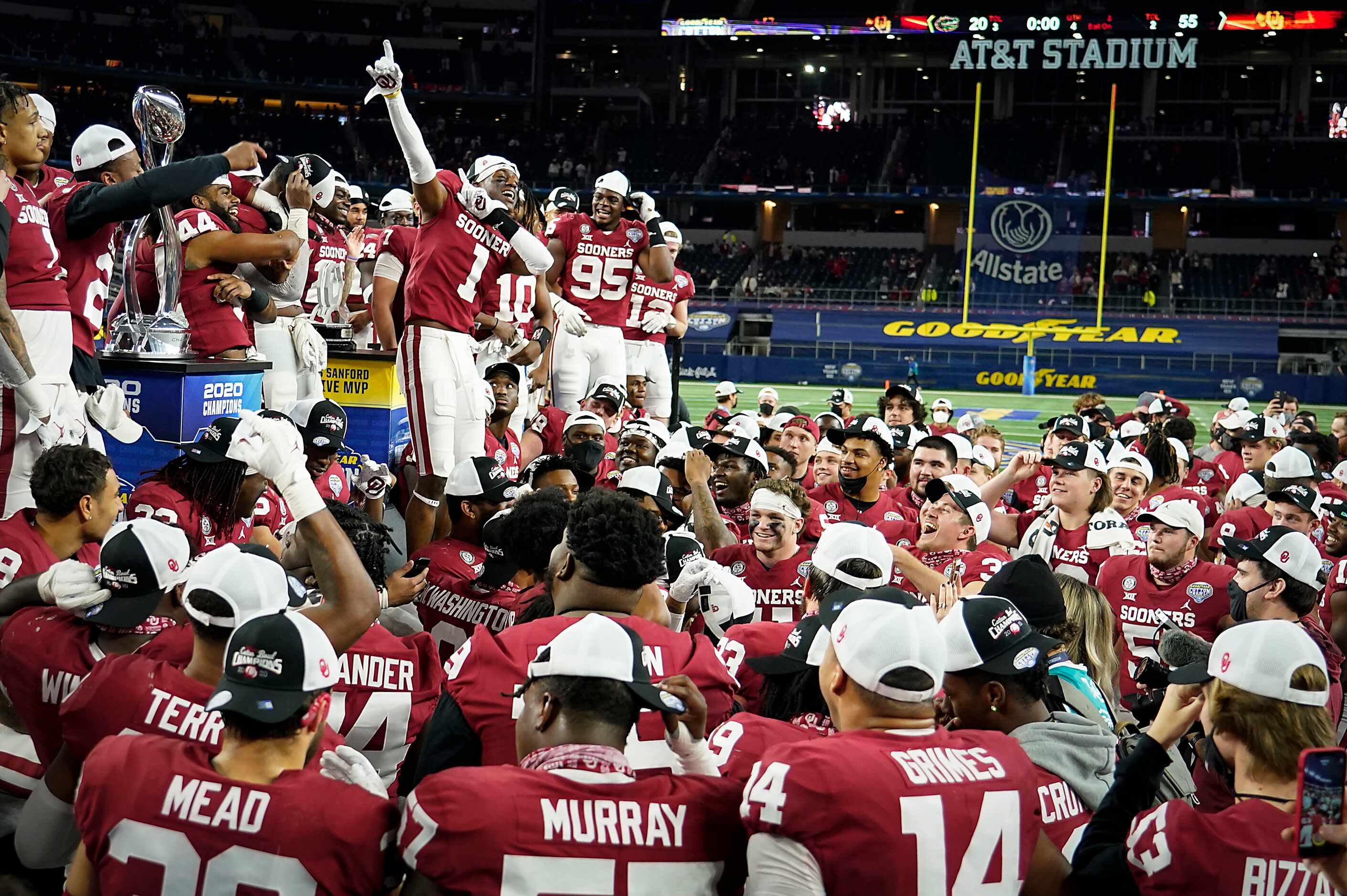 Oklahoma players celebrate after a victory over Florida in the Cotton Bowl Classic at AT&T...