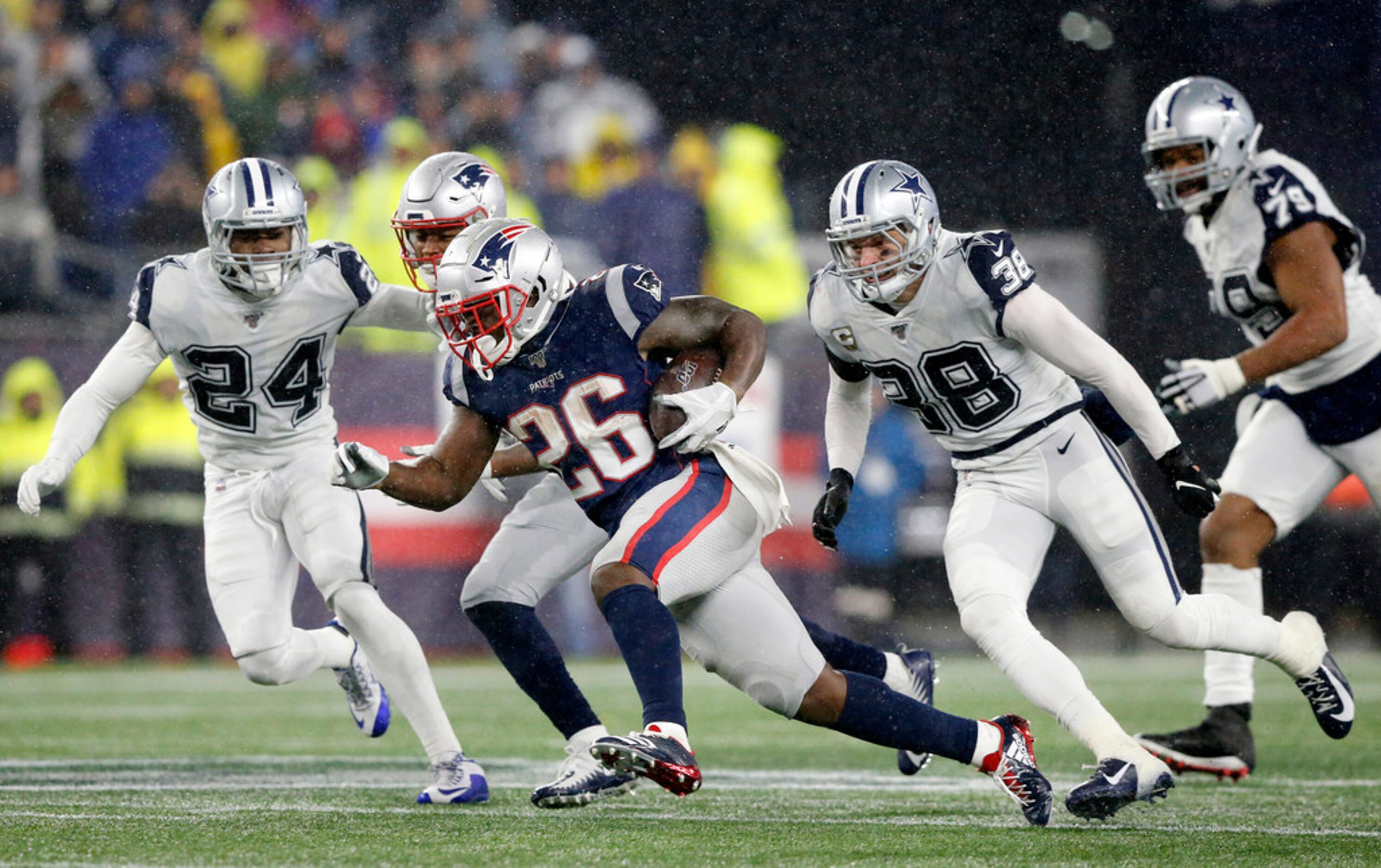 New England Patriots running back Sony Michel (26) breaks away from Dallas Cowboys strong...