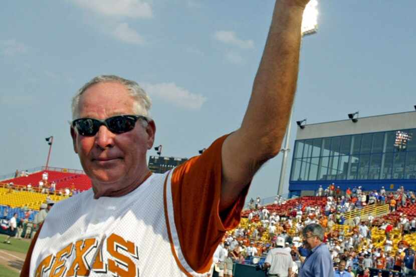 FILE - In this June 26, 2005, file photo,  Texas coach Augie Garrido tips his hat to the...