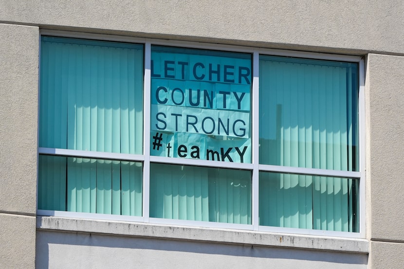 A sign is posted in the window at the Letcher County County Courthouse on Friday, Sept. 20,...