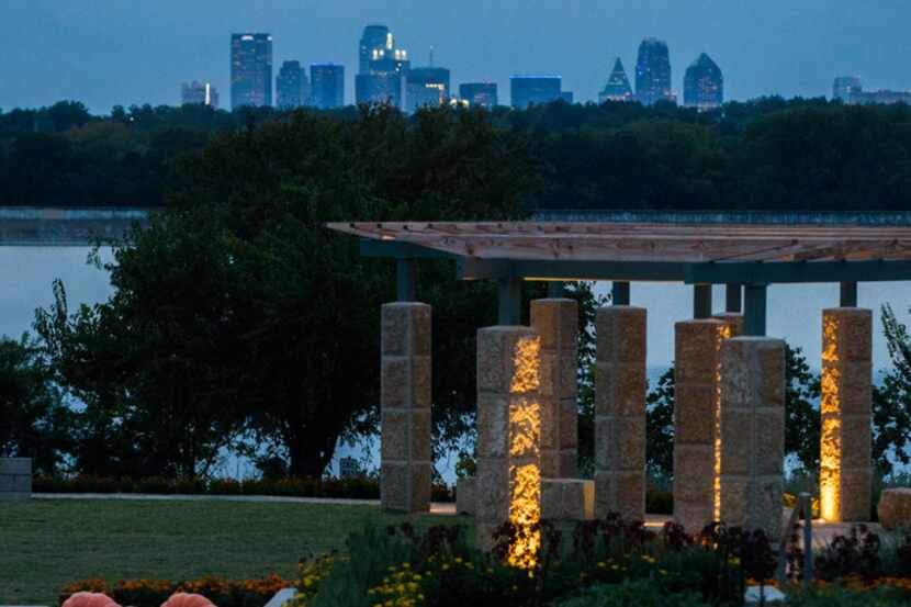 The Dallas skyline and White Rock Lake are visible from the new Tasteful Place edible garden...