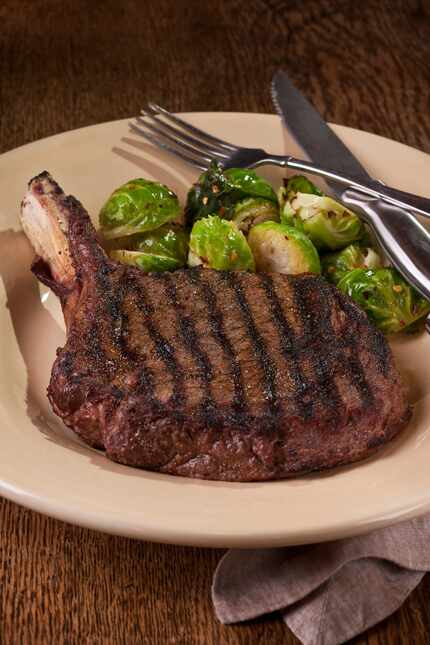 The Cowboy Steak, a bone-in ribeye, is a signature at Perini Ranch Steakhouse. 