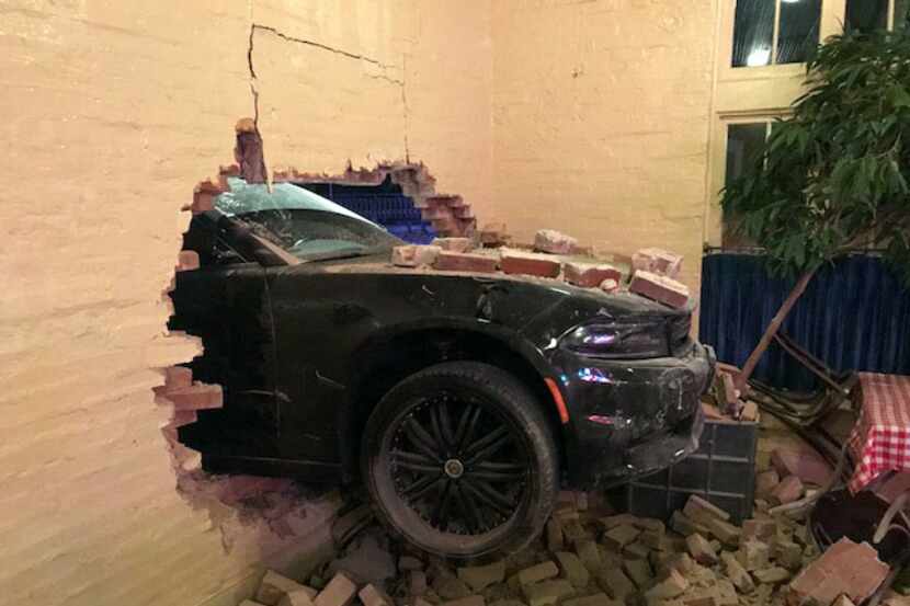 A driver drove this Dodge car through the wall of S&D Oyster Company in the early-morning...