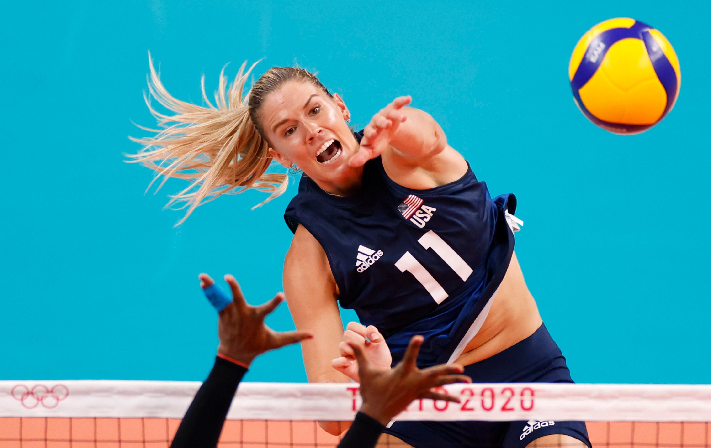 USA’s Andrea Drews (11) spikes the ball as Dominican Republic’s Bethania de la Cruz de Pena...