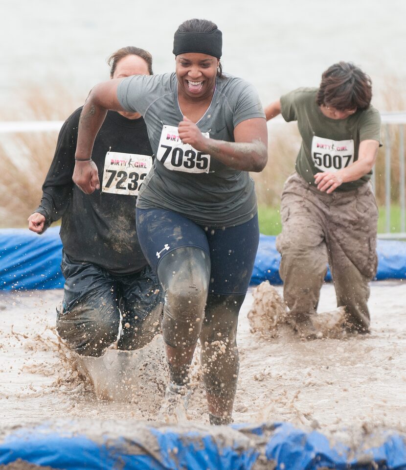 Women competing in the Dirty Girl Mud Run at Cedar Hill State Park on Saturday, Oct. 6, 2012.  