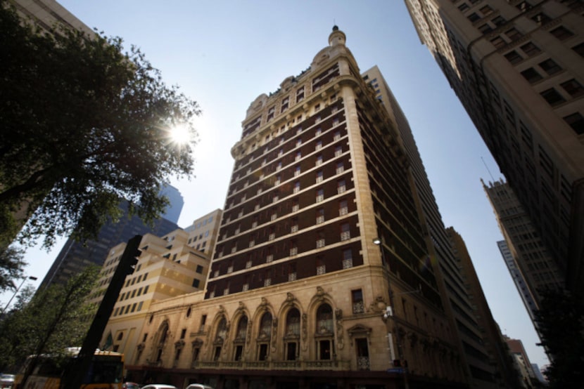 The Adolphus, flanked by nearby hotels that have spent multiple millions in the past few...