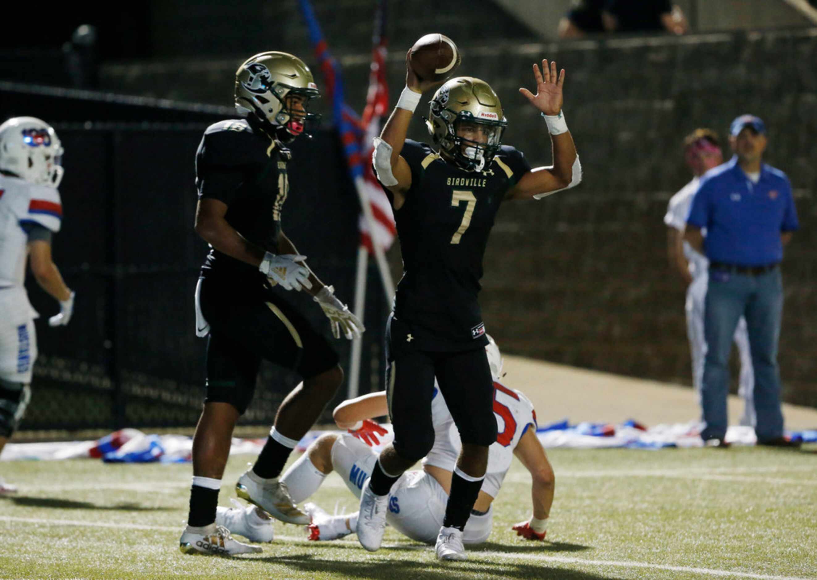 Birdville's Hosea Armstong (7) celebrates his receiving touchdown against Grapevine during...