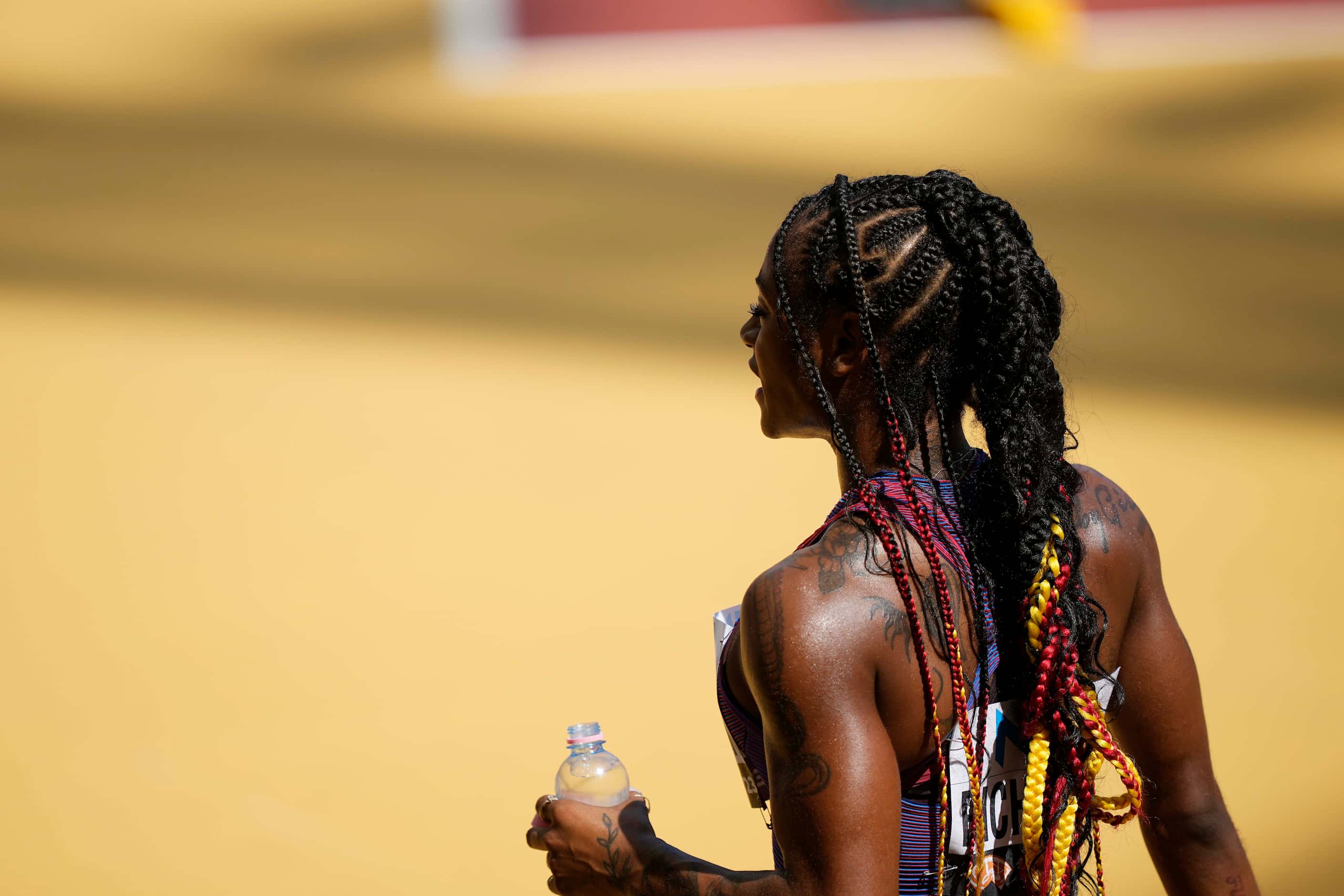 Sha'Carri Richardson, of the United States, drinks water after competing in the Women's...