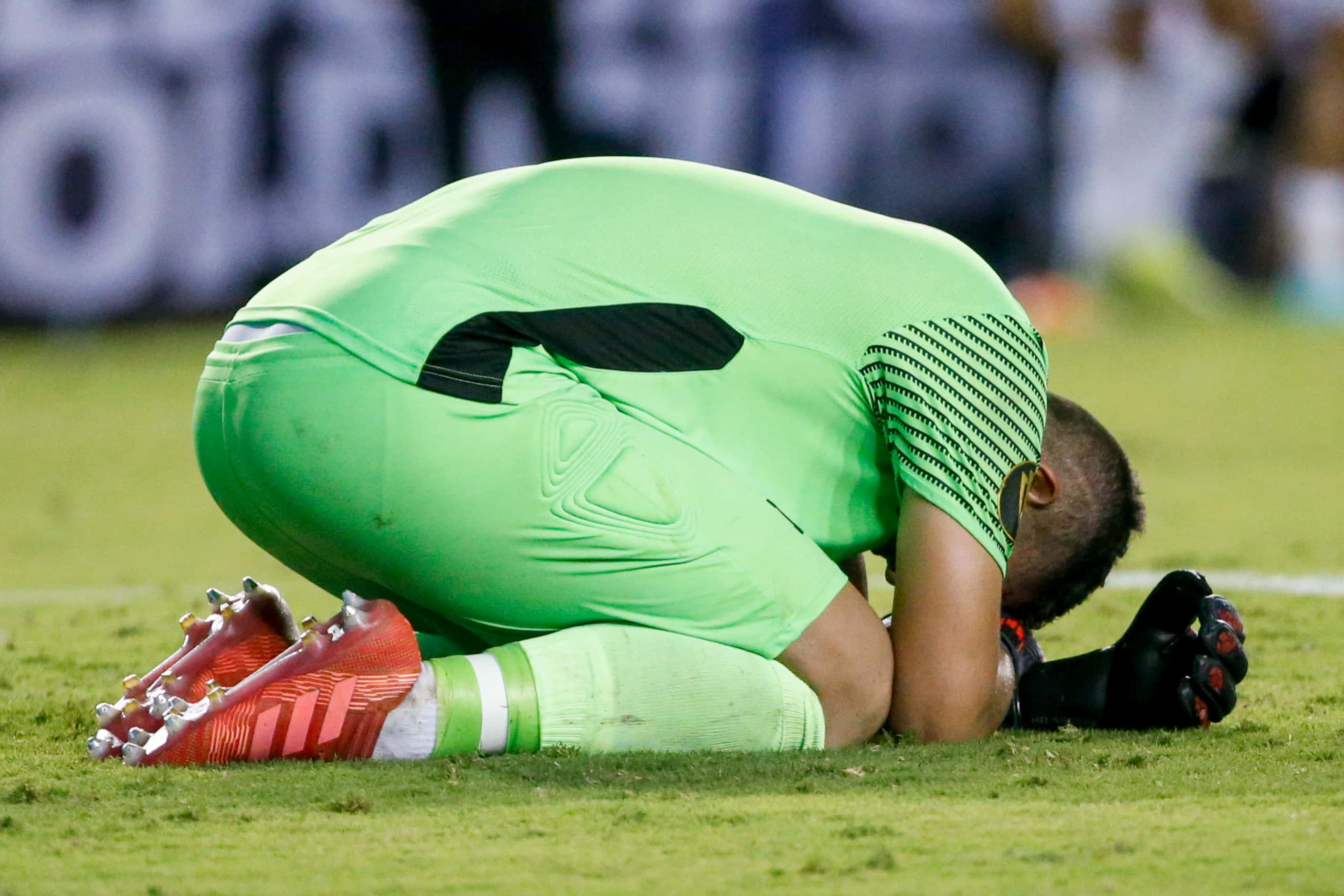 El Salvador goalkeeper Mario González (1) lays on the ground after a 1-0 loss during a...