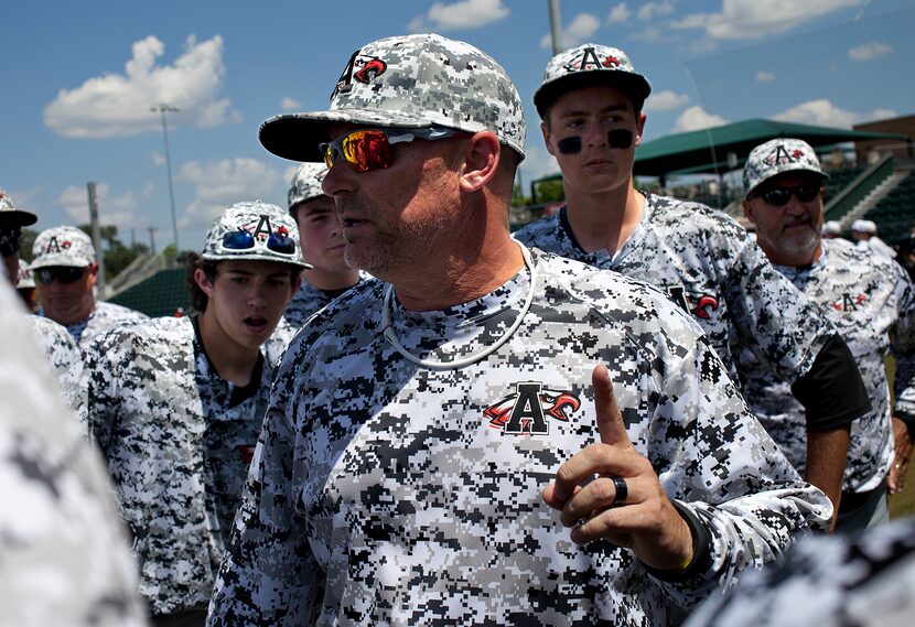 Argyle coach Ricky Griffin talks to his team after their win against Abilene Wylie at the...