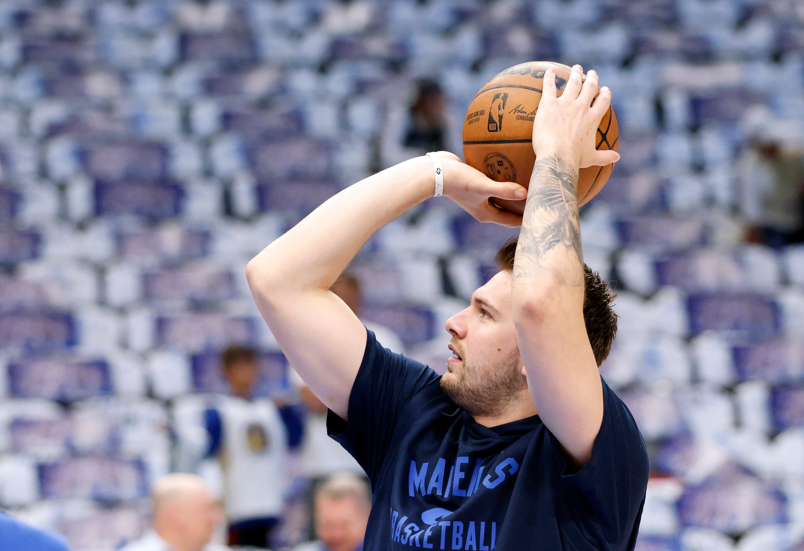 Dallas Mavericks guard Luka Doncic (77) warms up before facing the Golden State Warriors in...