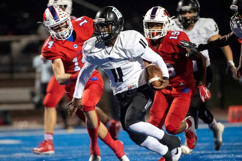 Running back Charles Crawford (11) is pictured during a 2018 game when he played for Bishop...