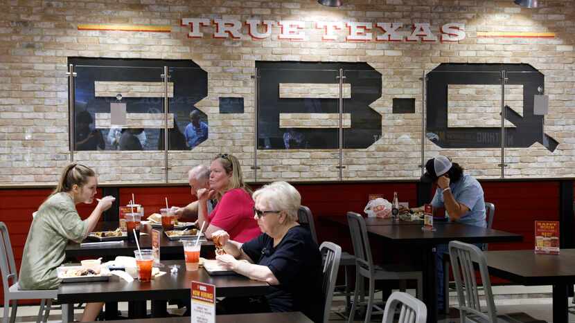 People dine at True Texas BBQ inside an H-E-B, Friday, July 28, 2023 in McKinney, Texas.