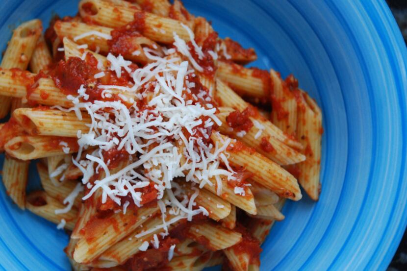 A rich, deeply flavored tomato sauce baked in the oven is great for pasta and pizza.