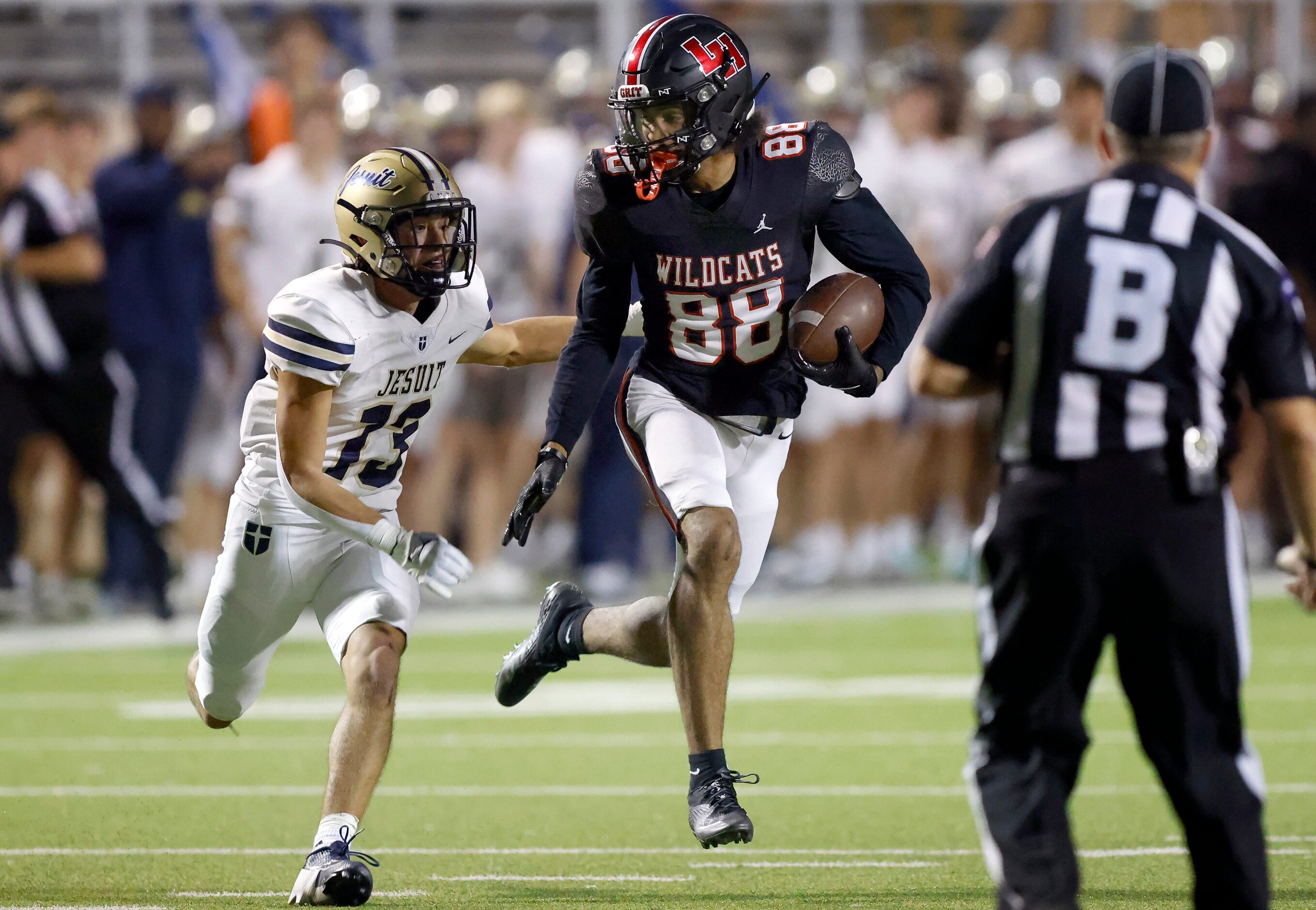 Lake Highlands High wide receiver Jordan Hutchison (88) catches a long pass across the...