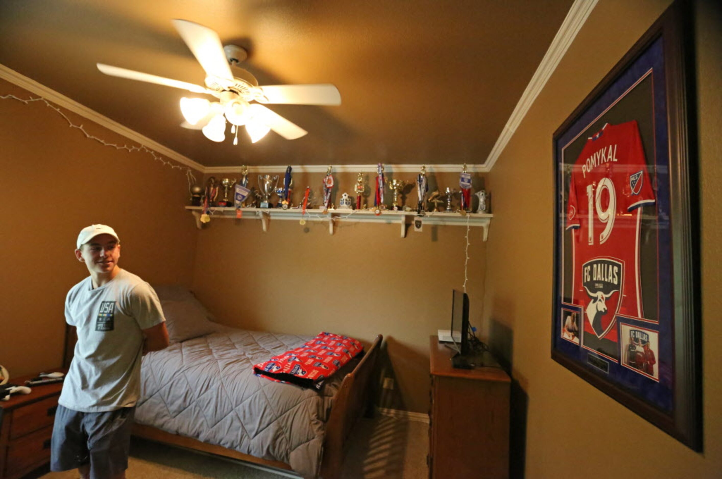 Paxton Pomykal is pictured in his bedroom at his home in Highland Village, Texas,...