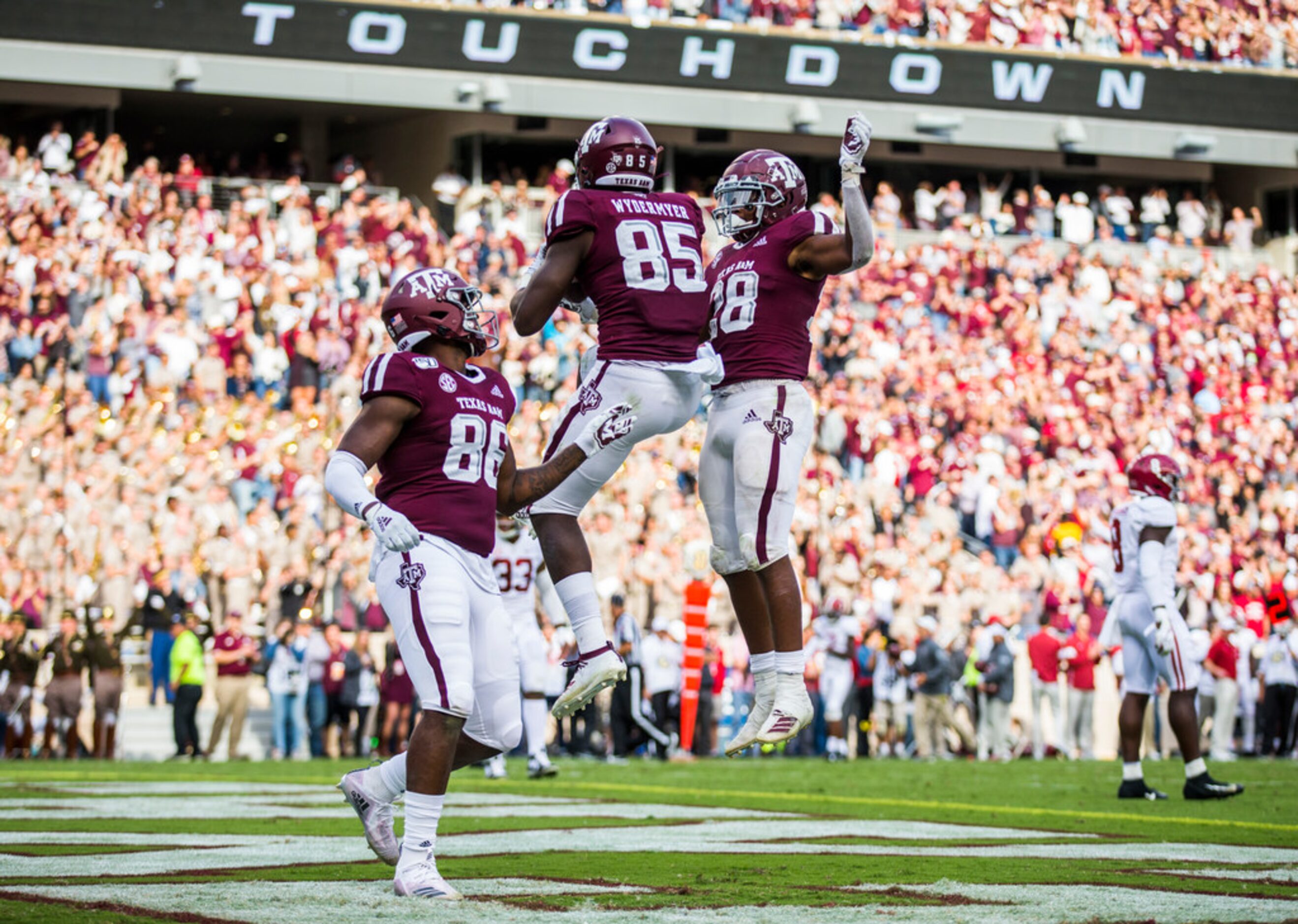 Texas A&M Aggies tight end Jalen Wydermyer (85) celebrates a touchdown with tight end Glenn...