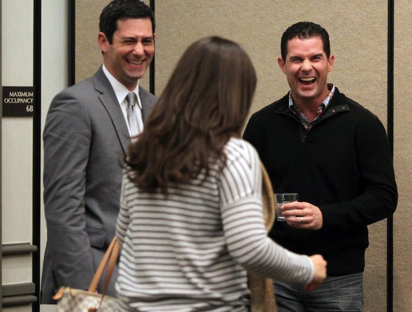 Former Texas Rangers' Michael Young, stands by his wife Cristina