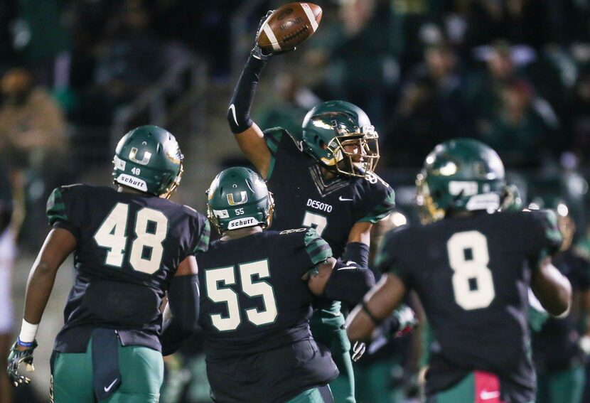 DeSoto defensive back Jabbar Muhammad (7) celebrates after recovering a fumbled ball during...