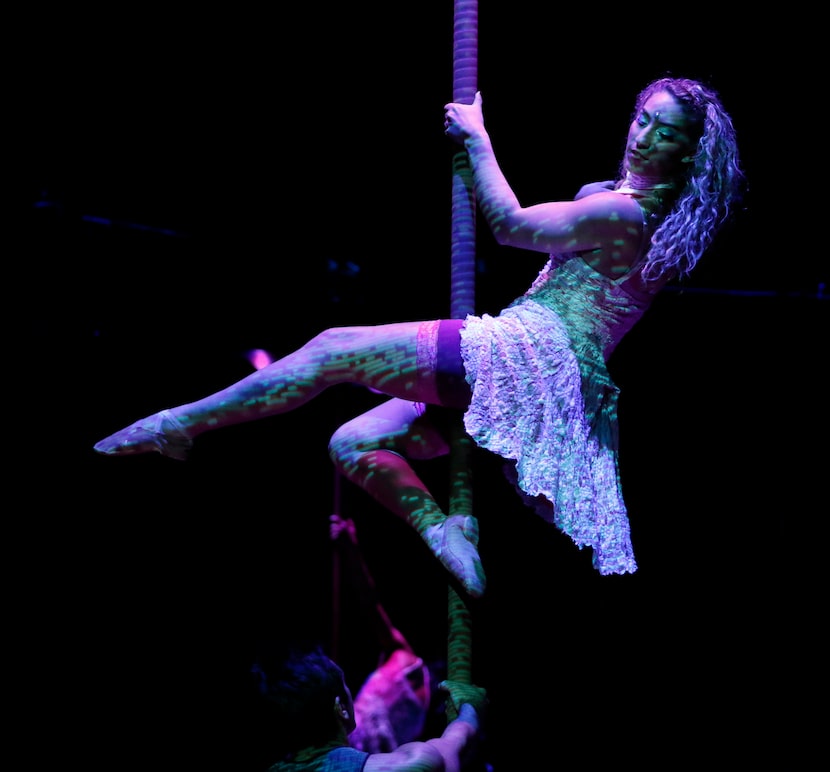 An acrobat performs during a preview of Cavalia's production Odysseo in Frisco, Texas on...