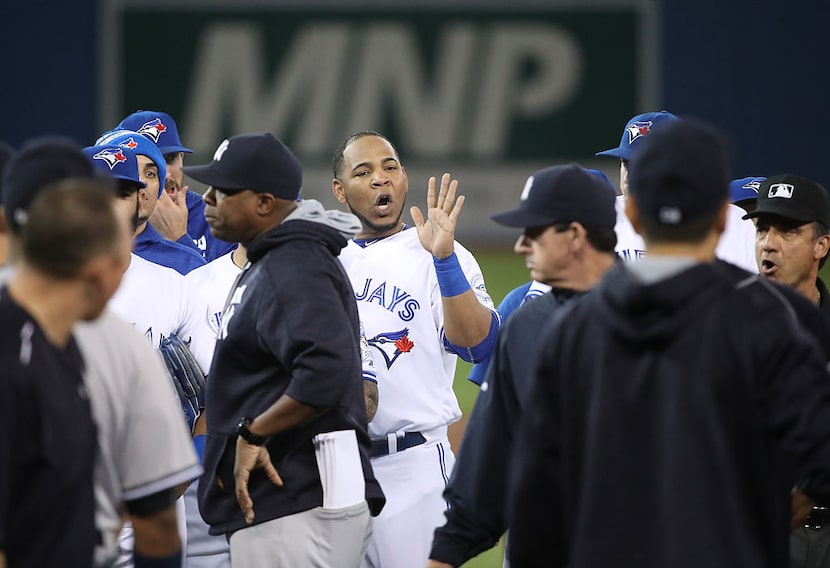 TORONTO, CANADA - SEPTEMBER 26: Edwin Encarnacion #10 of the Toronto Blue Jays has words for...