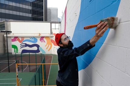Muralist Kyle Steed says when inspiration is lacking, he simply starts work and "inspiration...