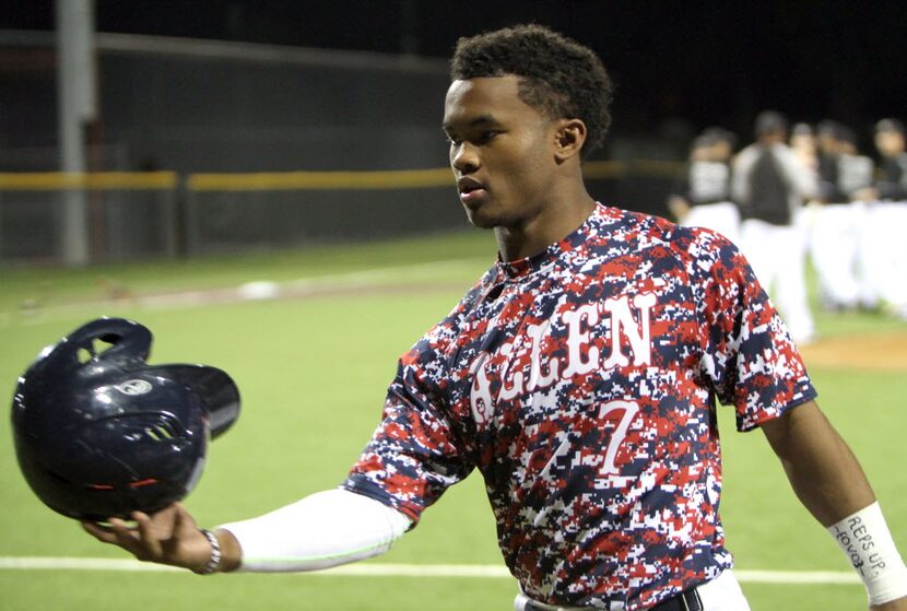 FILE - Allen Eagles designated Eagles designated hitter Kyler Murray (7) removes his helmet...