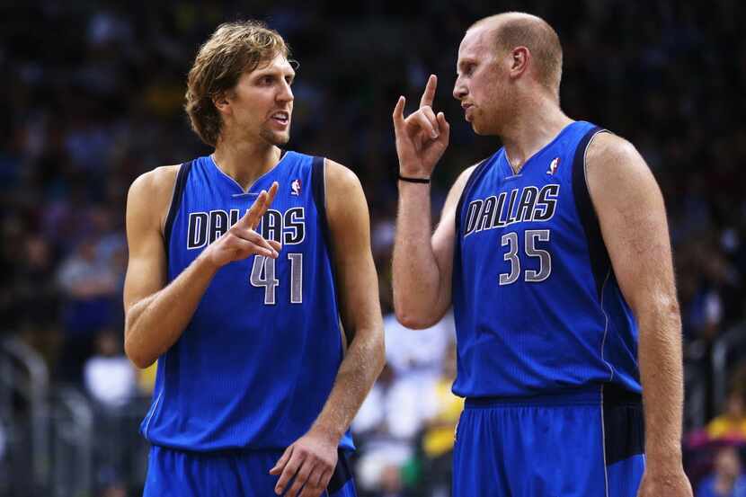 Chris Kaman (R) and Dirk Nowitzki of Dallas chat during the NBA Europe Live 2012 Tour match...